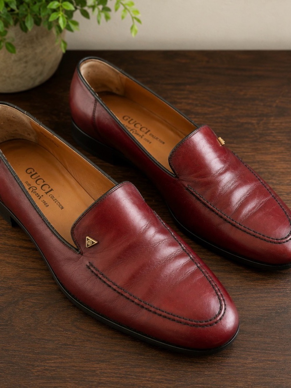 Gucci Men's Wine Red Leather Slip-On Loafers with Gold Accents